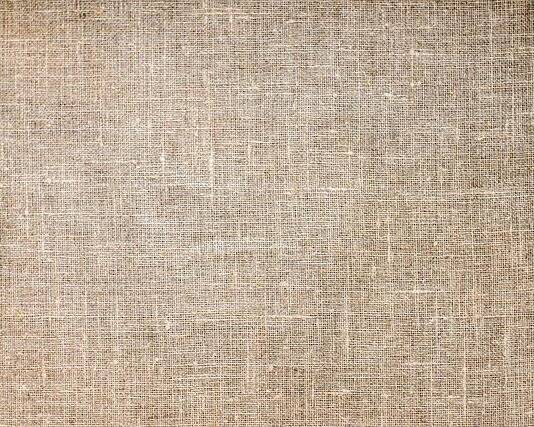 Z jakiej tkaniny są szyte lalki?